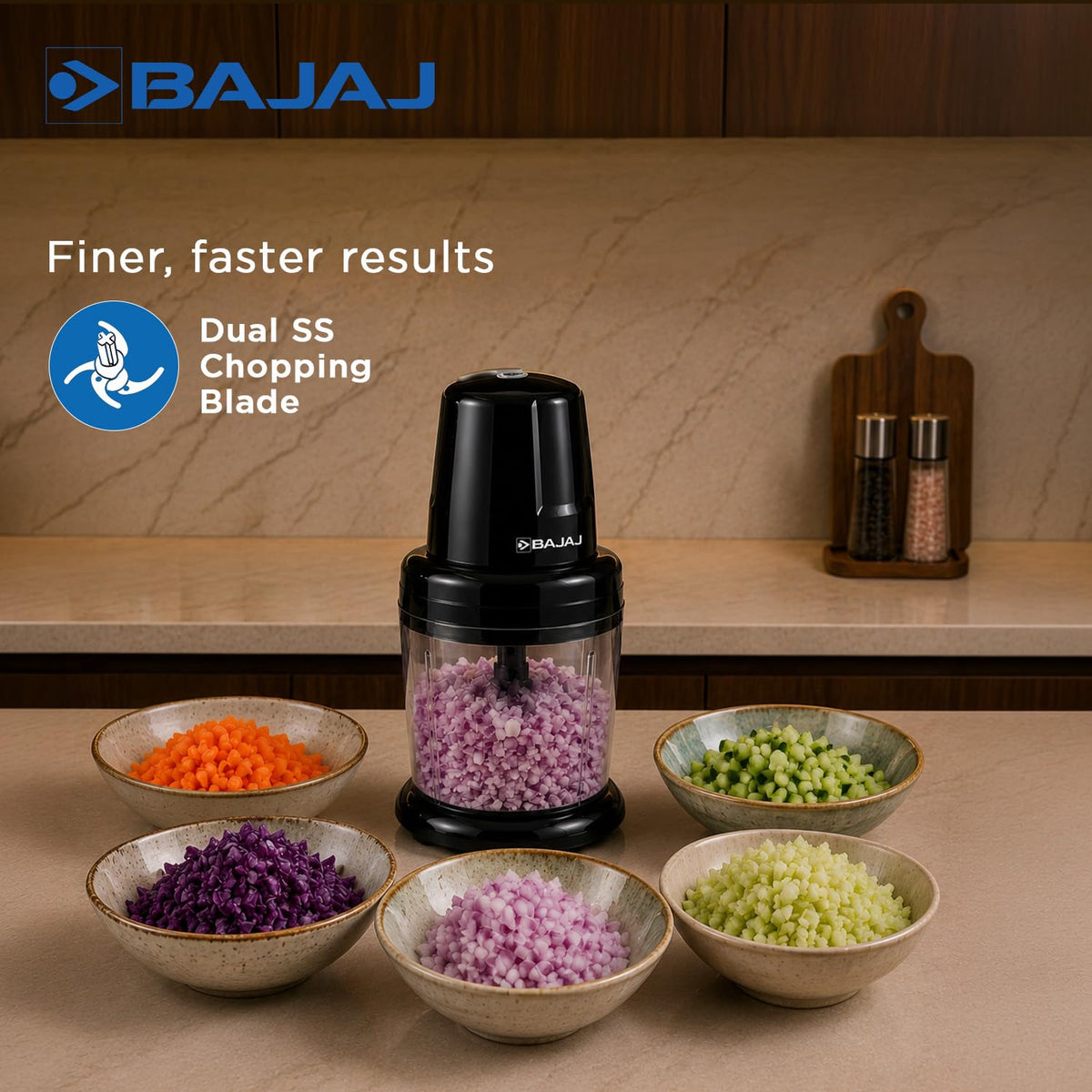 Bajaj Chop Pro chopper with chopped onion in the bowl and six bowls of diced vegetables, highlighting the Dual SS chopping blade