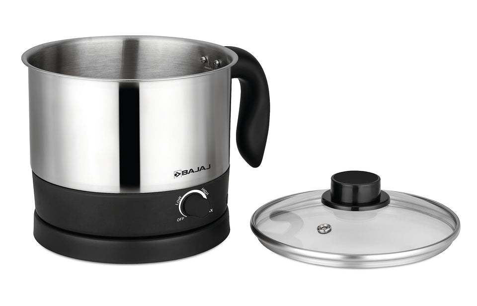 Bajaj KTS 1.0 Multicook kettle with its glass lid placed beside it