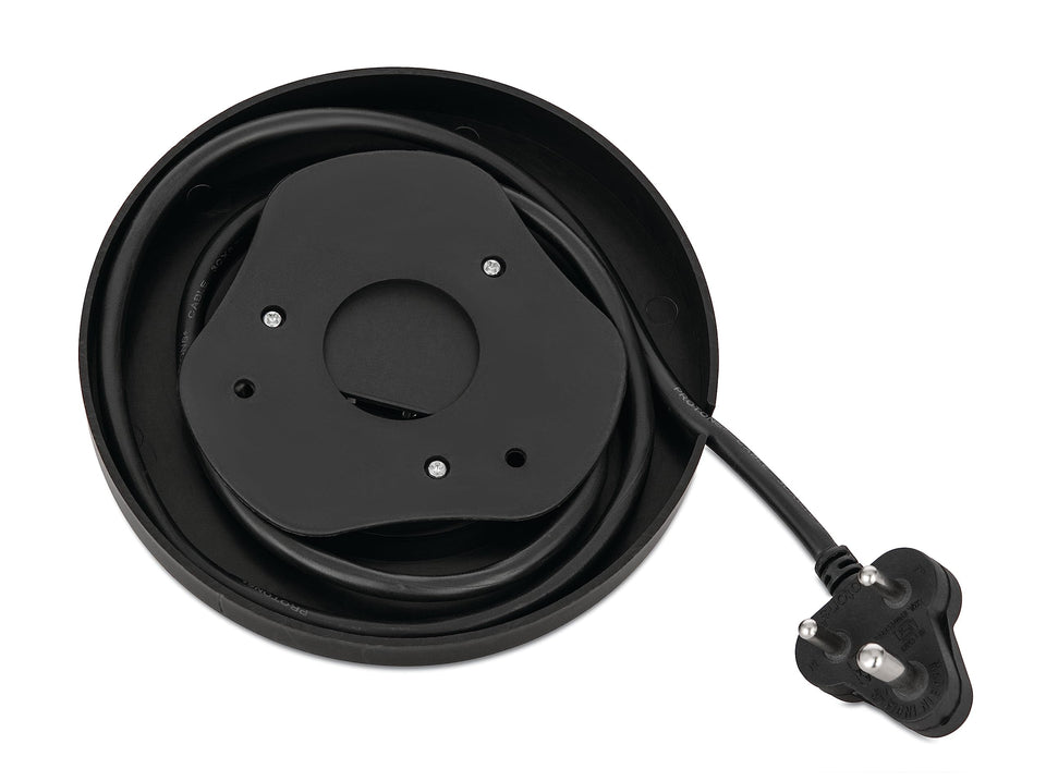 Underside of the Bajaj KTS 1.0 Multicook base showing the stored power cord and three-pin plug