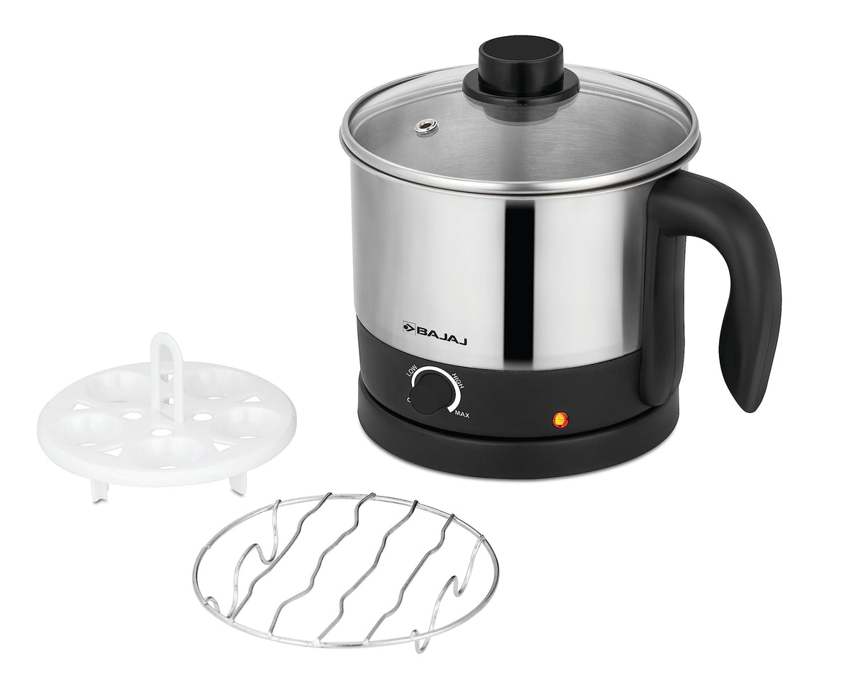 Bajaj KTS 1.0 Multicook kettle with egg-holder tray and steel rack shown alongside