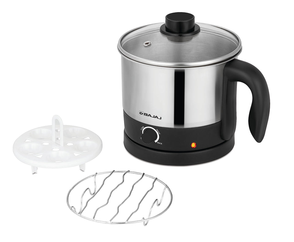 Bajaj KTS 1.0 Multicook kettle with egg-holder tray and steel rack shown alongside