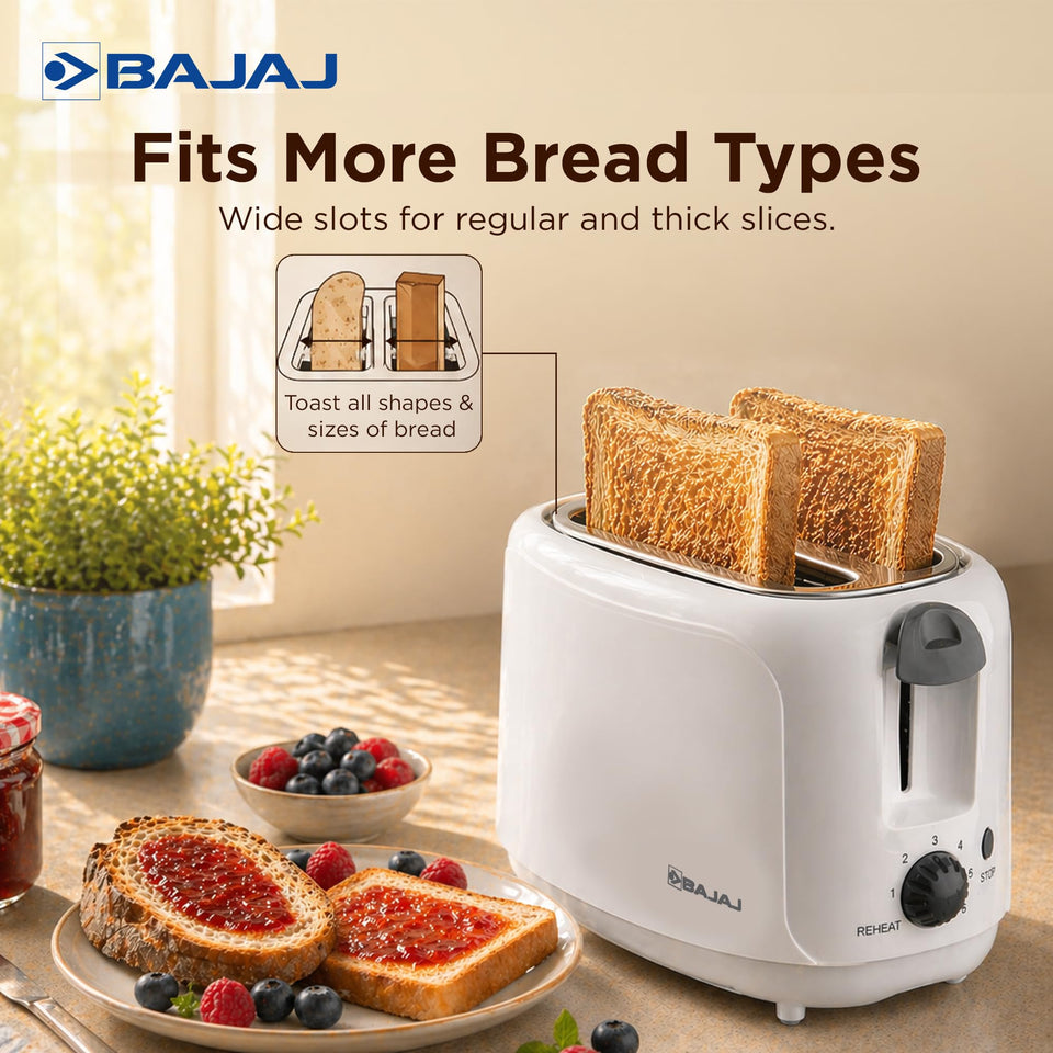 Bajaj ATX 4 toaster with wide slots toasting two slices, with a diagram of regular and thick bread fitting the slots