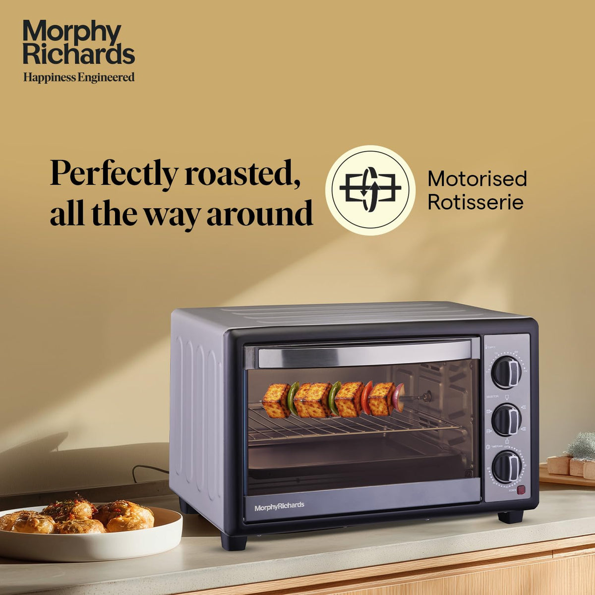 Morphy Richards 510070 30 RC Manual OTG with paneer skewers on the motorised rotisserie