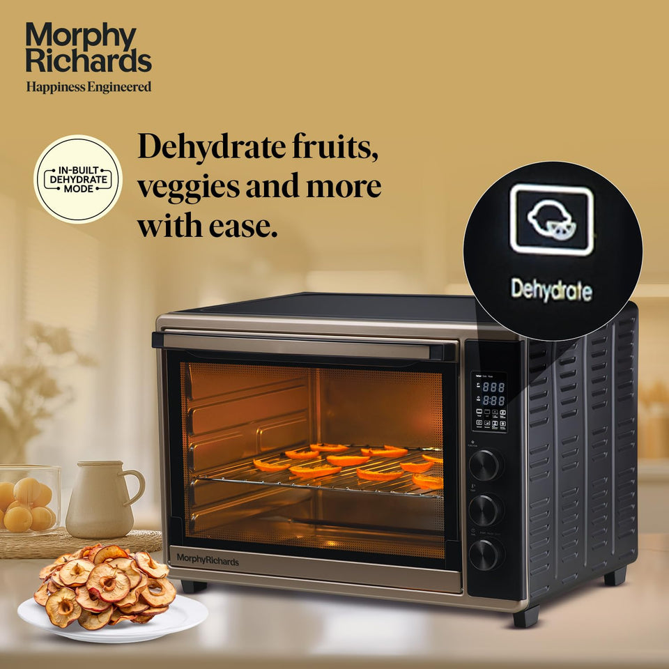 Morphy Richards 52RCD Digi OTG dehydrating fruit slices with the in-built Dehydrate mode icon highlighted