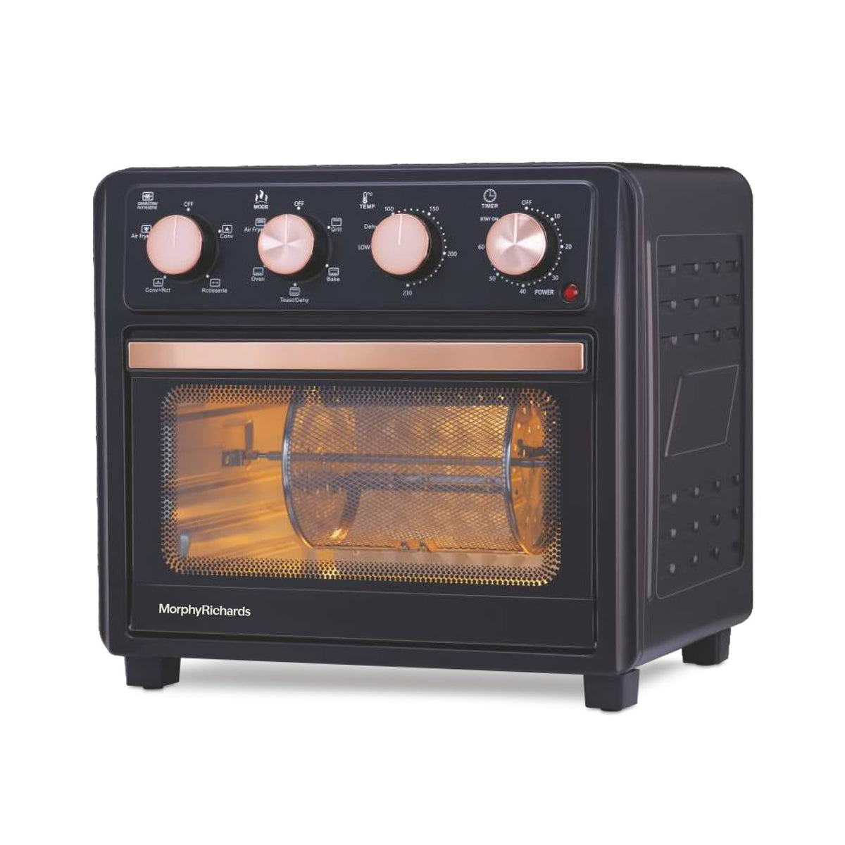 Morphy Richards 510060 AirCrisp air fryer oven angled view showing the rotisserie basket inside the cavity and the side vents