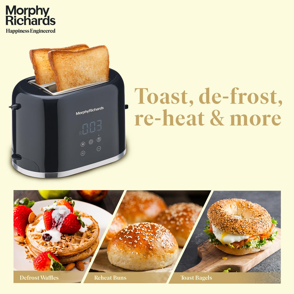 Morphy Richards 370071 black toaster with two toasted slices, alongside defrosted waffles, reheated buns and toasted bagels