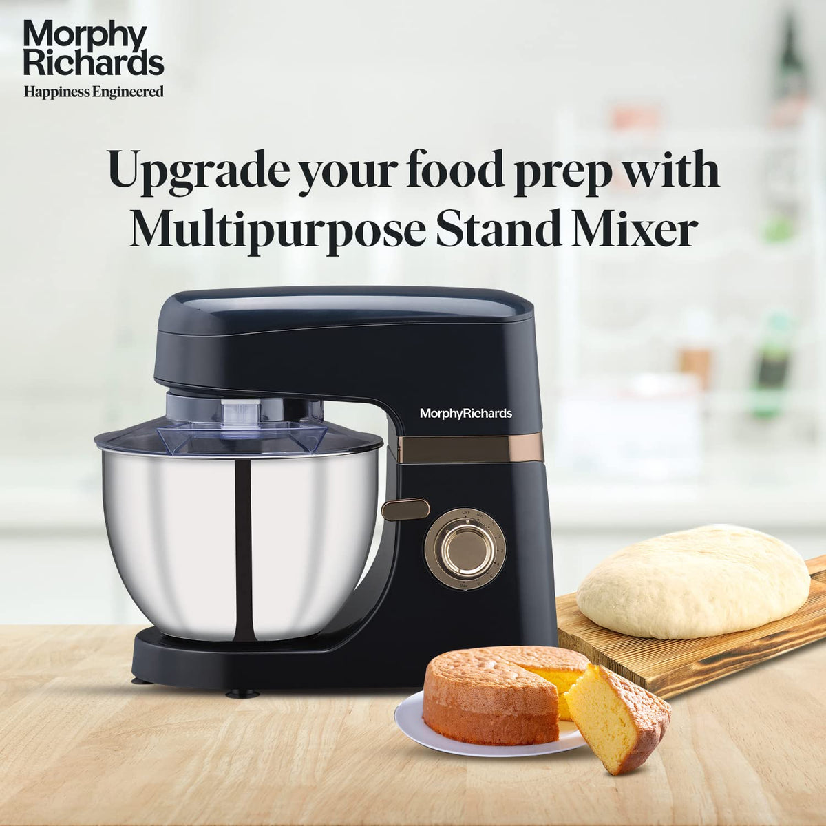 Morphy Richards 400406 Melange stand mixer on a kitchen counter with bread dough and a sliced sponge cake