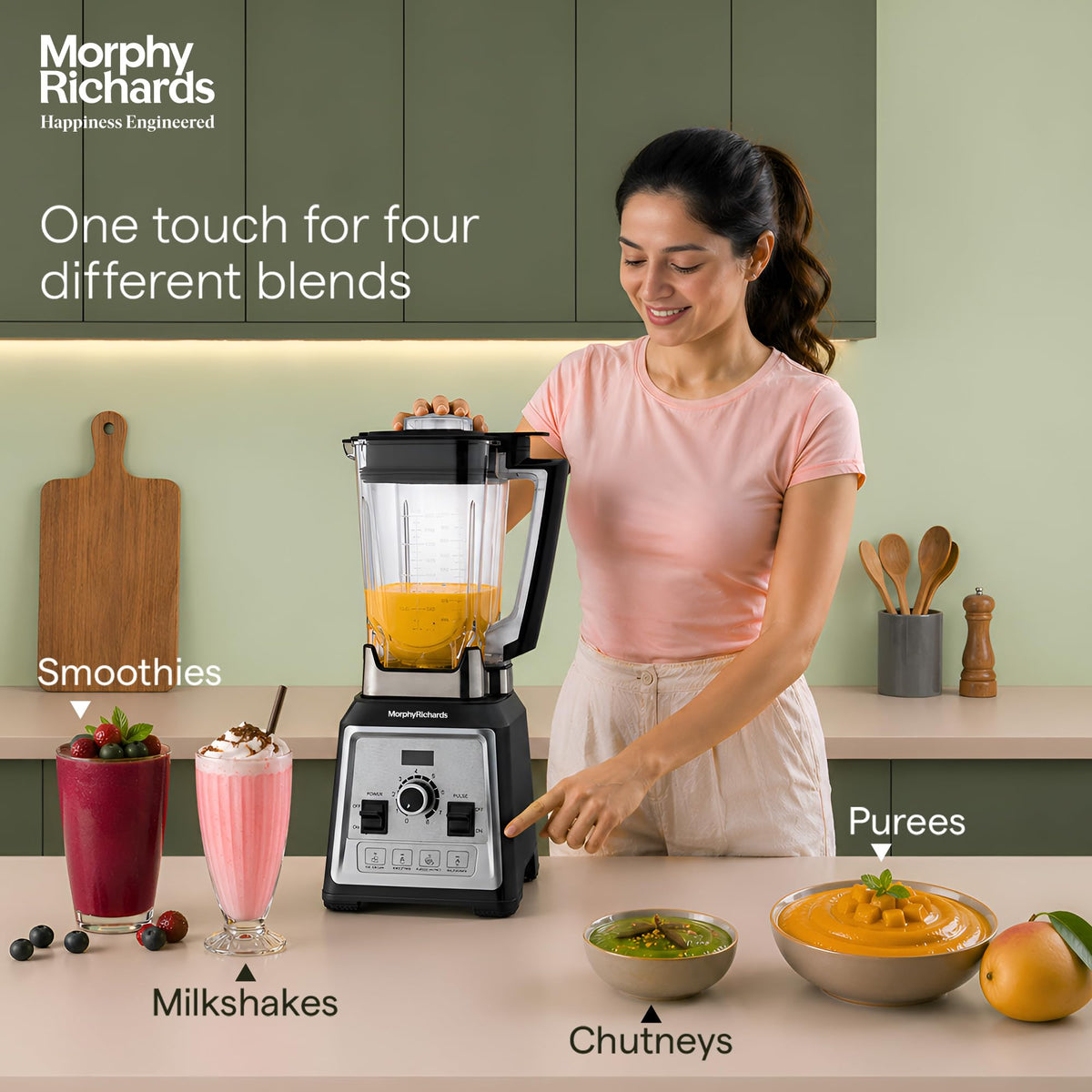 Woman using Morphy Richards Storm Blend 1000W blender, with smoothie, milkshake, chutney and puree shown
