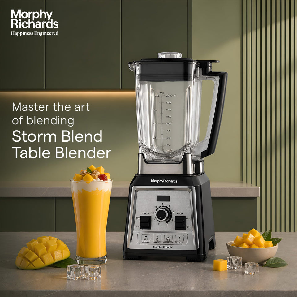 Morphy Richards Storm Blend 1000W blender in a kitchen beside a mango shake and fresh mango