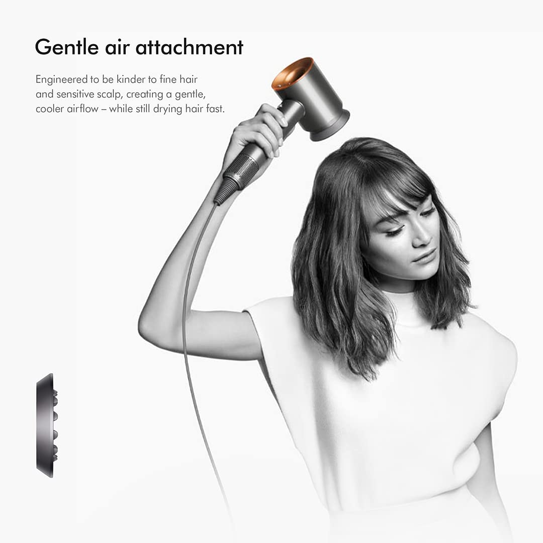 Dyson Supersonic 389934-01 hair dryer with gentle air attachment being used, with the attachment shown separately