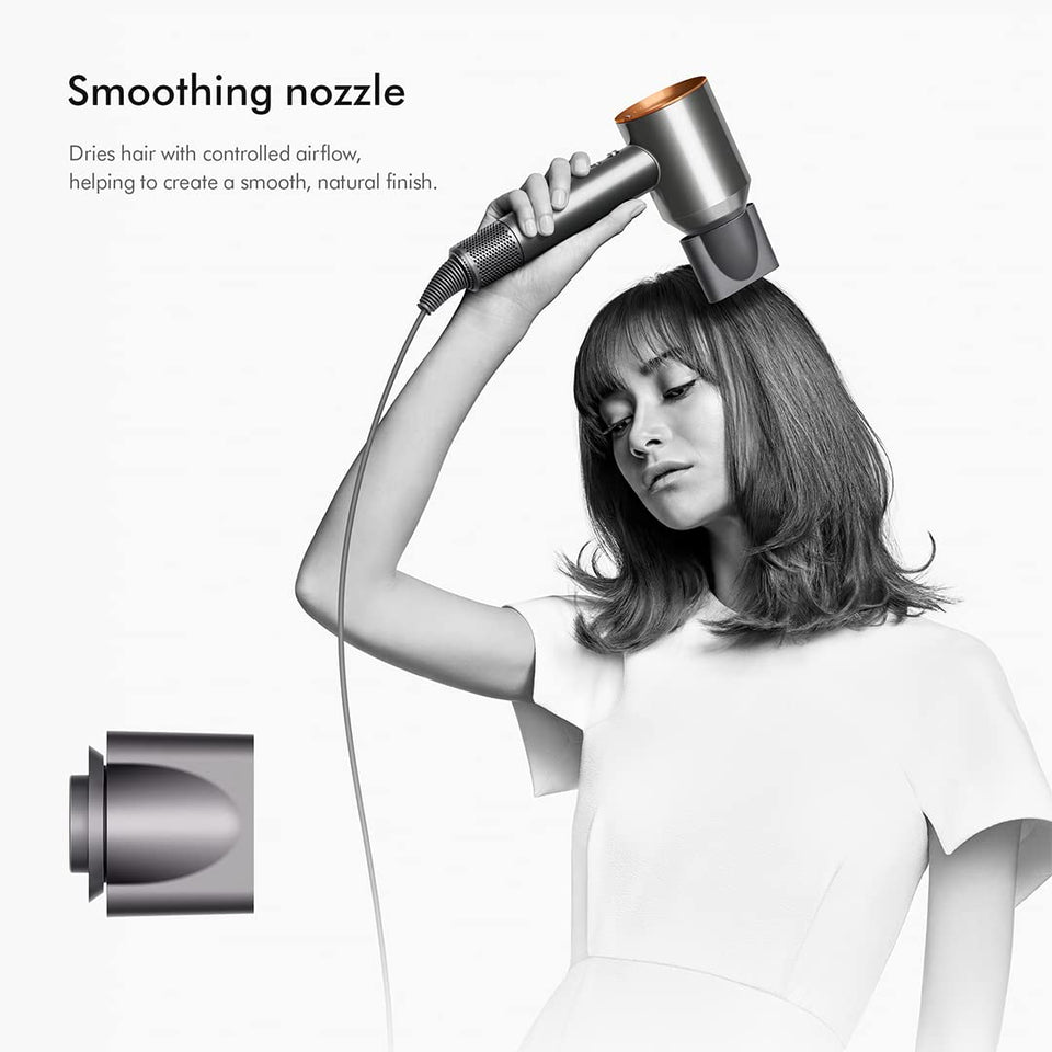 Dyson Supersonic 389934-01 hair dryer with smoothing nozzle drying hair, nozzle shown separately