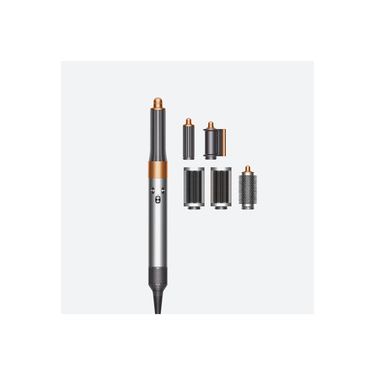 Dyson Airwrap 400706-01 Multi-Styler in Nickel/Copper with its attachments laid out beside the main styler body
