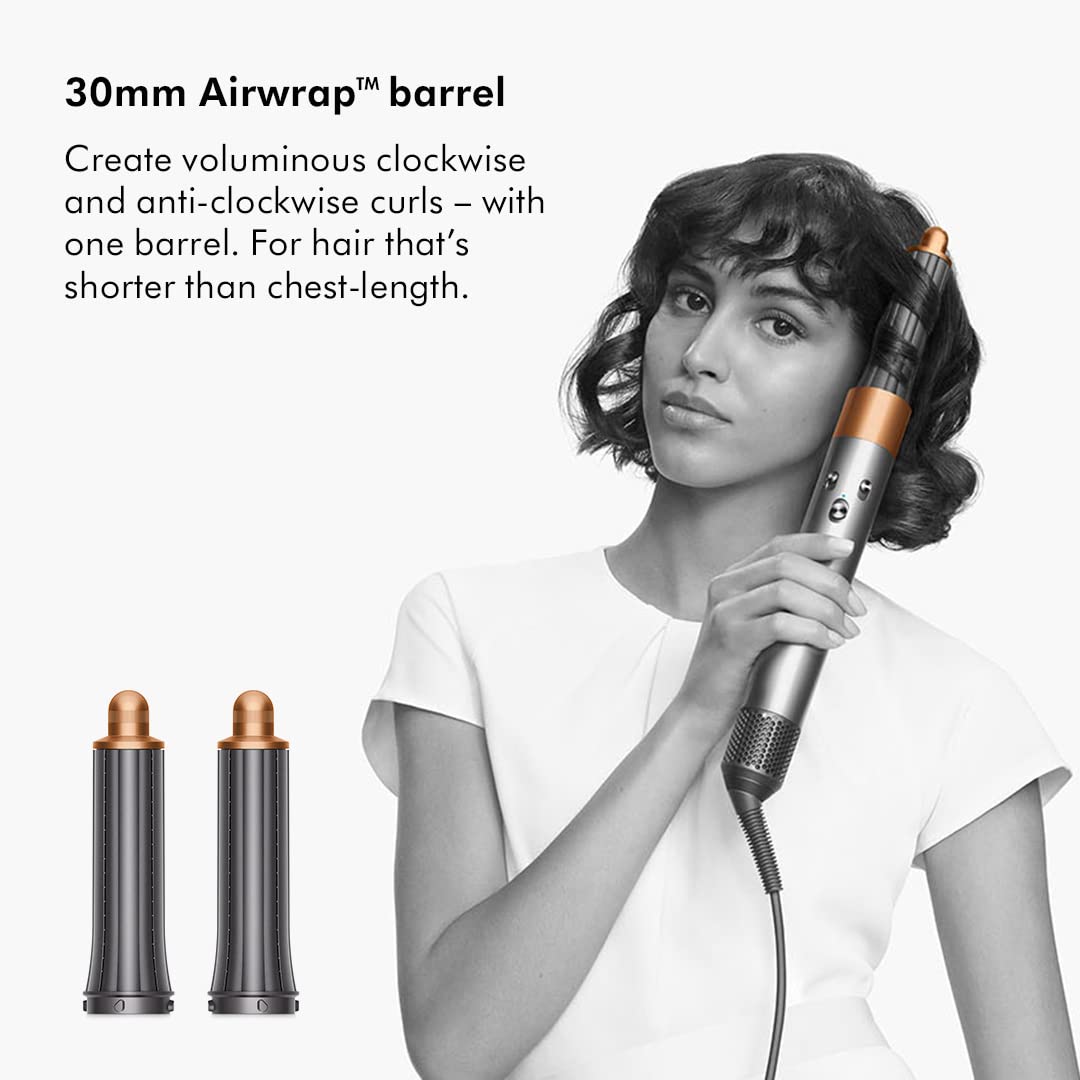 Dyson Airwrap 400706-01 with 30mm Airwrap barrel creating curls on short hair, with two barrels shown