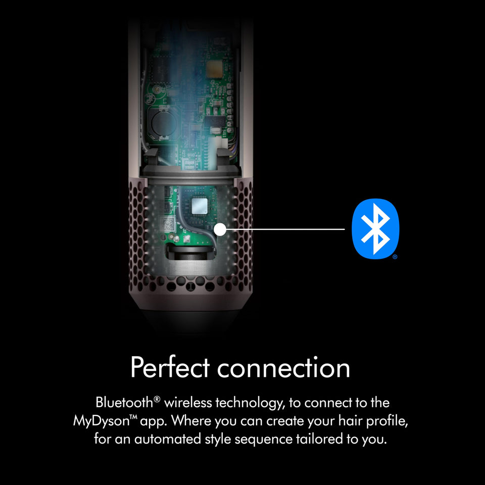 Cutaway of the Dyson Airwrap i.d. 601904-01 handle showing internal circuit boards and the Bluetooth symbol for MyDyson app connection