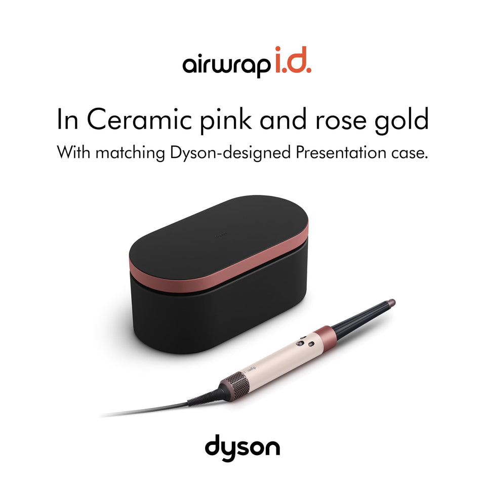 Dyson Airwrap i.d. 601904-01 in Ceramic Pink and Rose Gold beside its matching black and rose gold presentation case