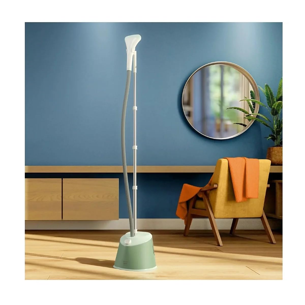 Philips STE1010/70 green garment steamer shown in a living room next to a chair and round mirror