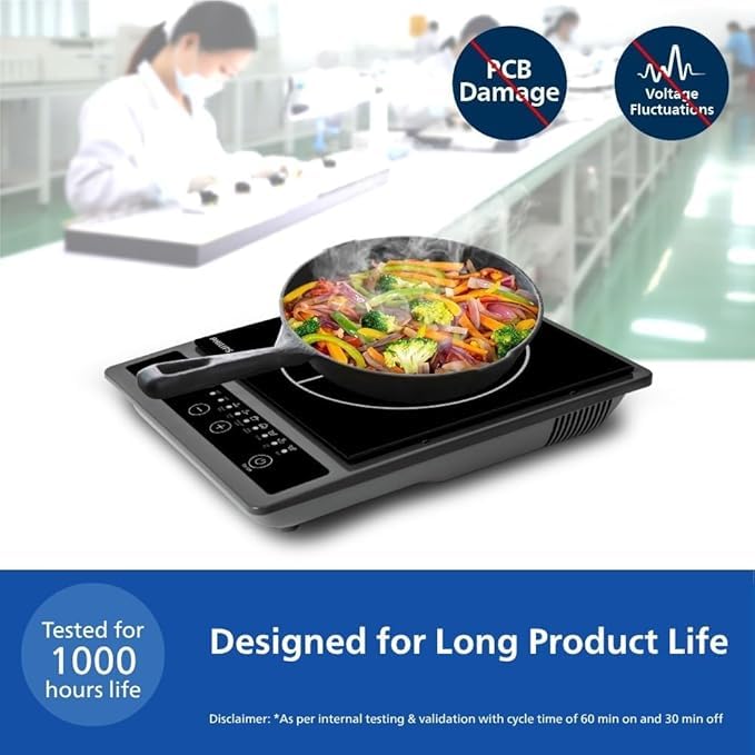 Philips HD4944/00 induction cooktop with a pan of stir-fried vegetables and a long product life message