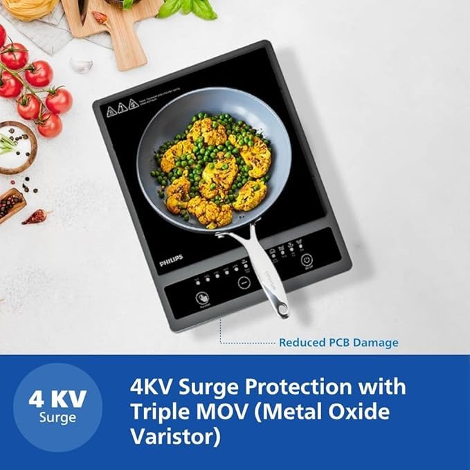 Philips HD4944/00 induction cooktop with a pan of cauliflower and peas highlighting 4KV surge protection