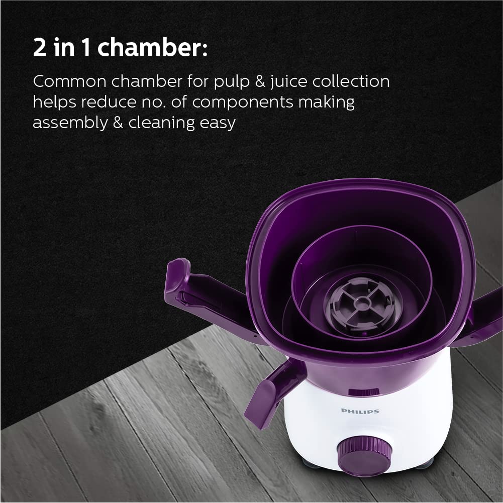 Philips HL7567/01 juicer with the lid open showing the 2-in-1 pulp and juice collection chamber