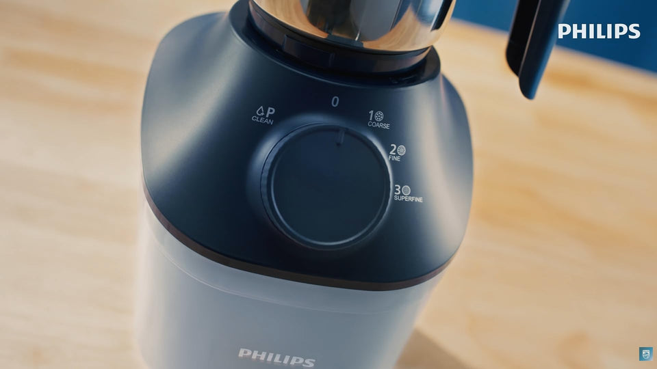 Close-up of the Philips HL7773/01 control dial marked Clean, 0, 1 Coarse, 2 Fine and 3 Superfine