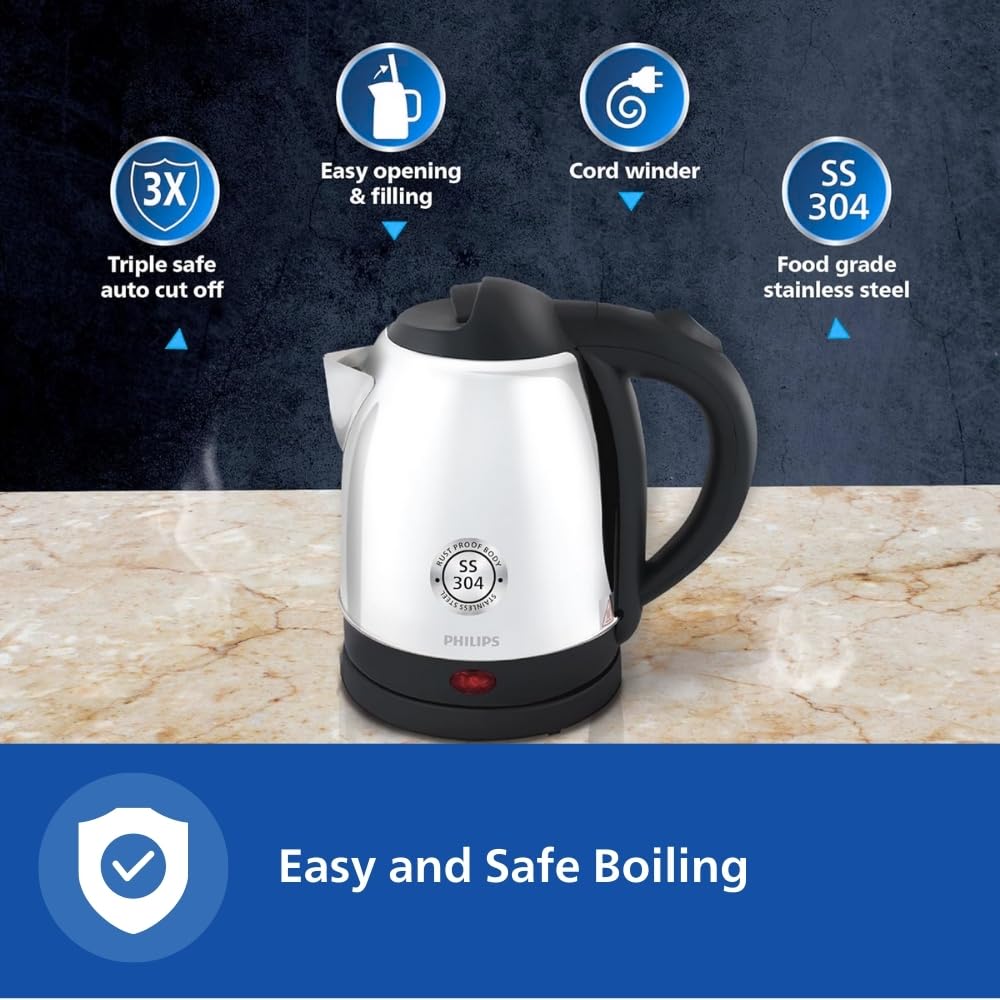 Philips HD9373/00 electric kettle on a marble counter with callouts for triple safe auto cut off, easy filling, cord winder and SS 304 steel
