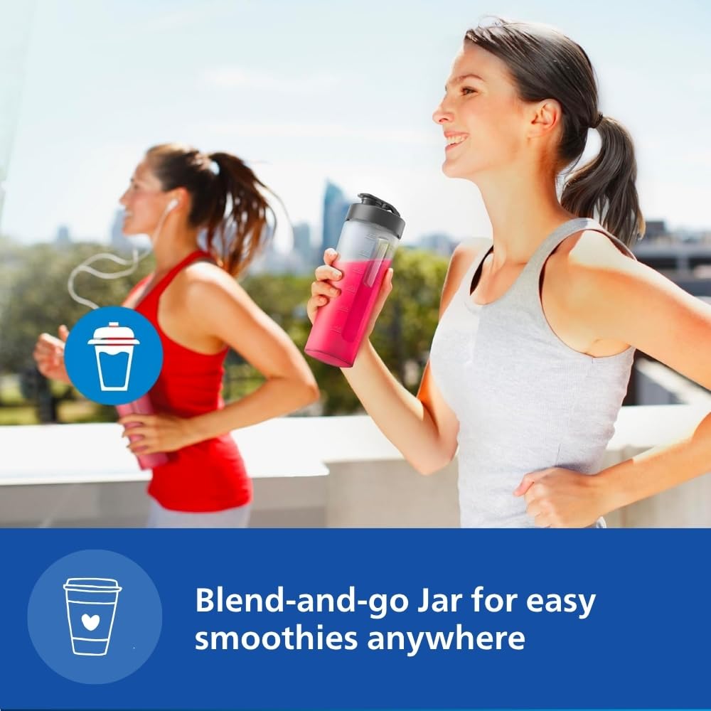 Woman jogging while holding a Philips HR2603/90 blend-and-go sipper jar filled with a pink smoothie