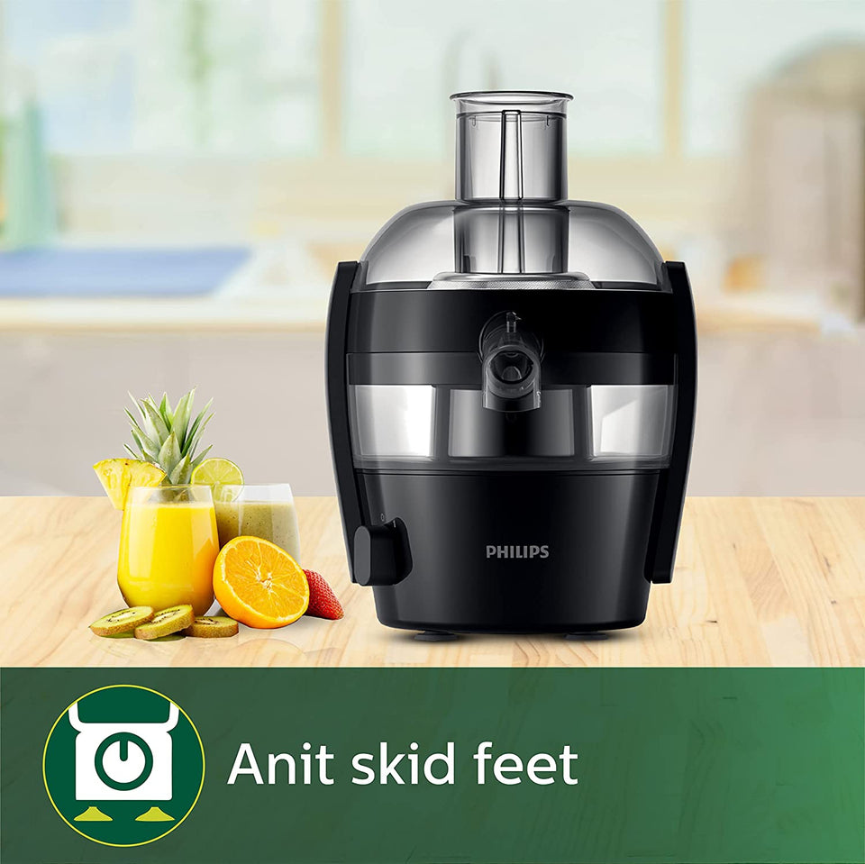 Philips HR1832/00 juicer on a countertop with fruit juices and fruits, highlighting anti-skid feet